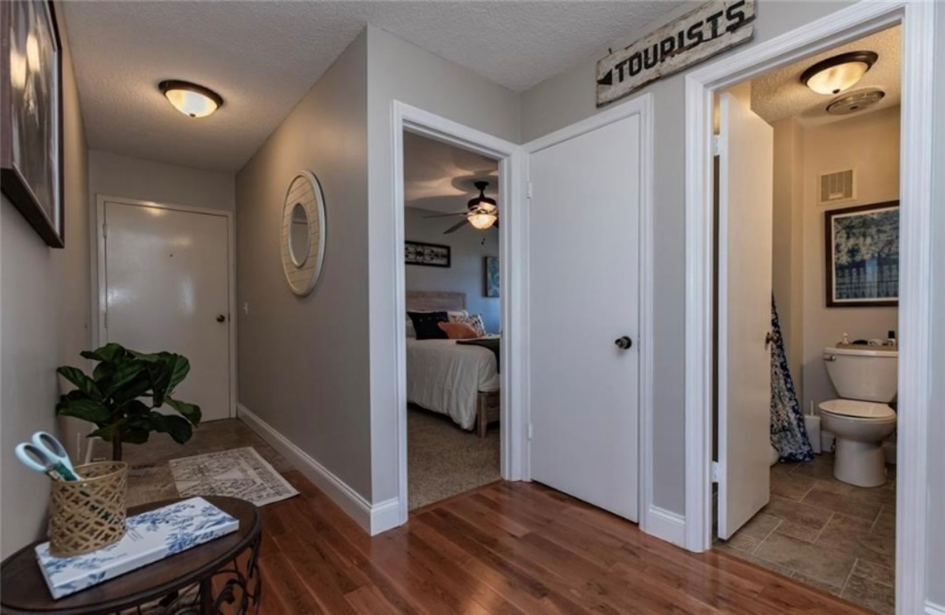 Hallway showing the entry, bedroom and bathroom