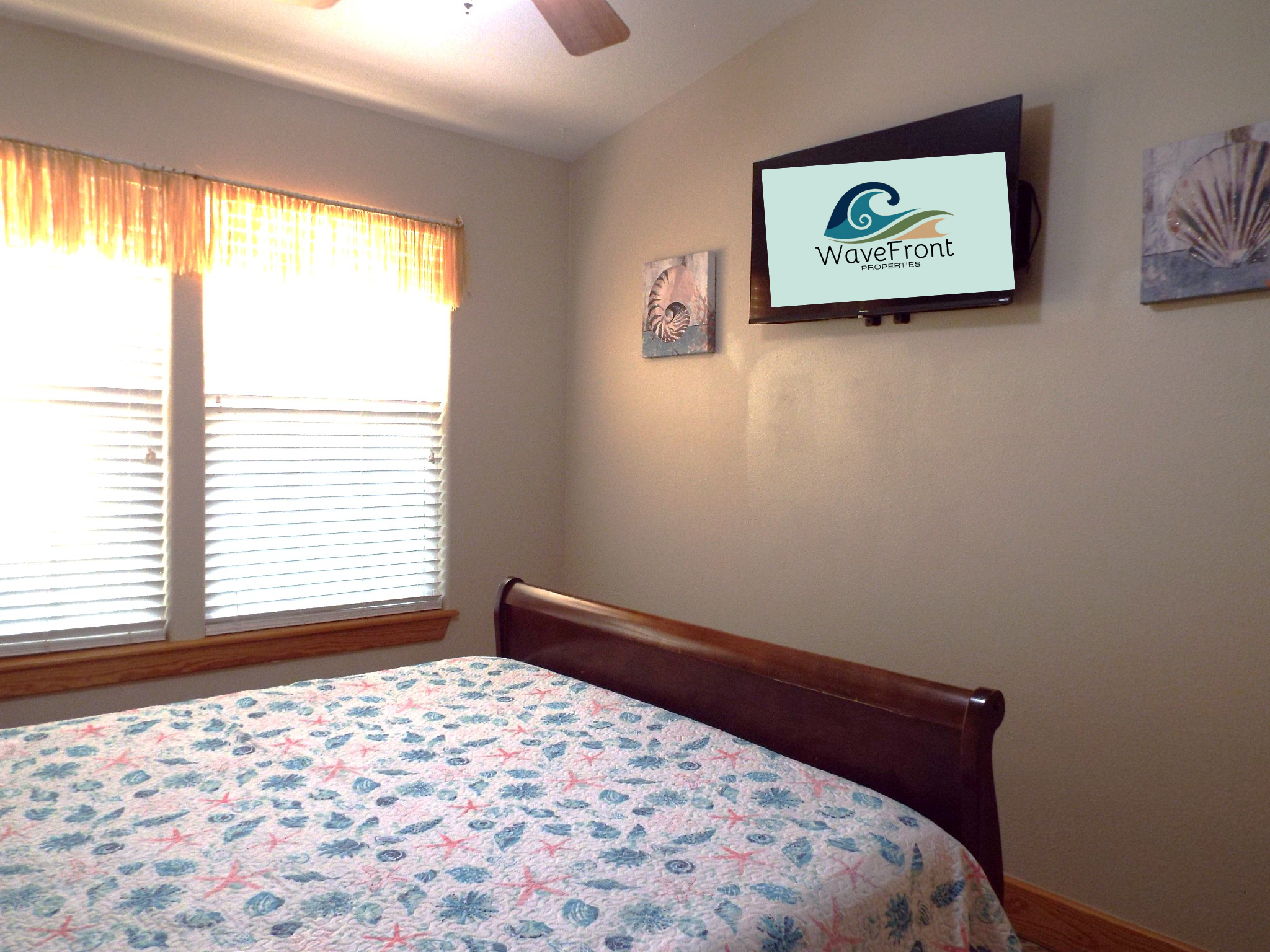 Side B bedroom #2 offers a flat screen TV and a queen bed