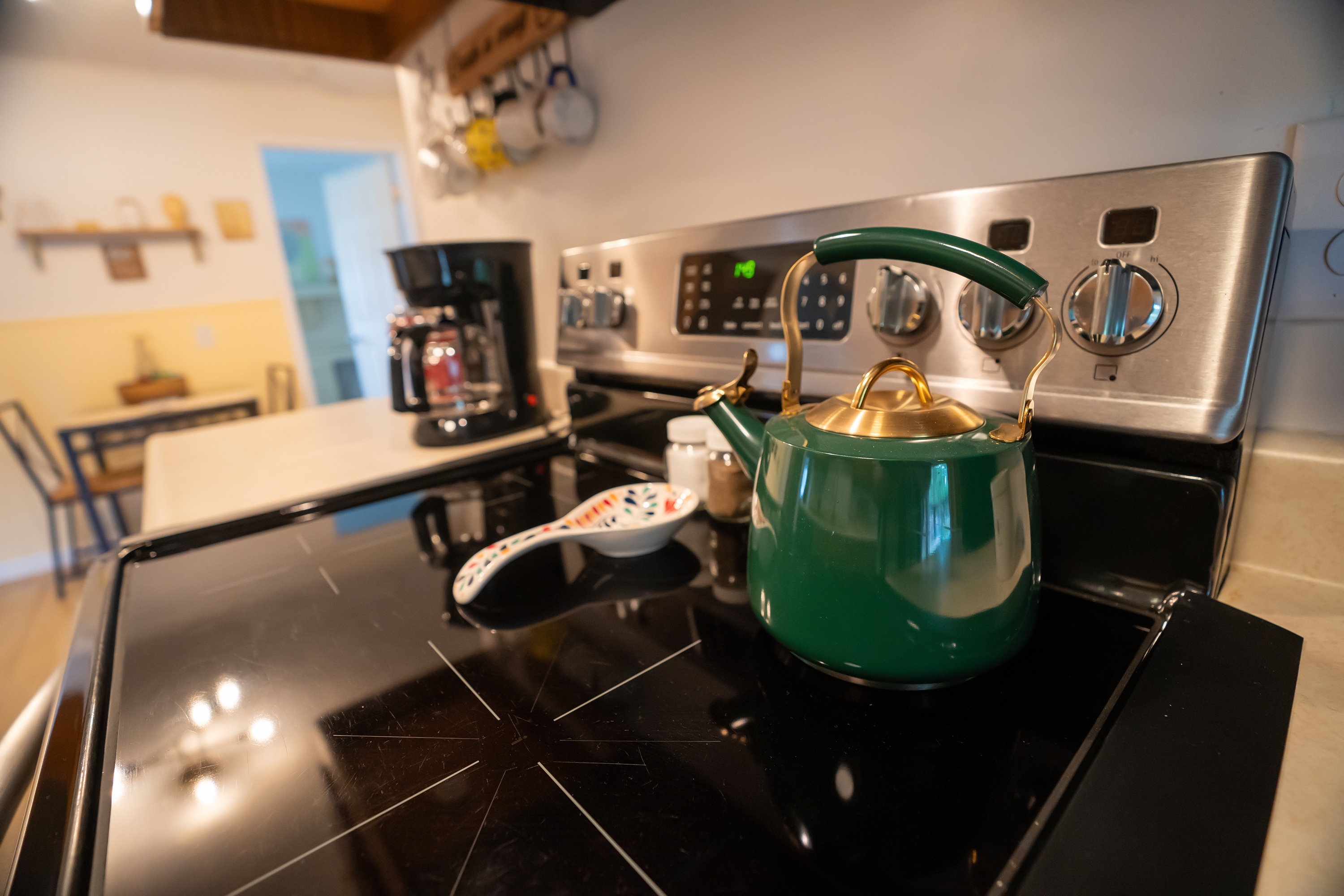 Simmer, sizzle, steep. The electric stove and oven are ready for your favorite meals—just don’t forget to put the kettle on!