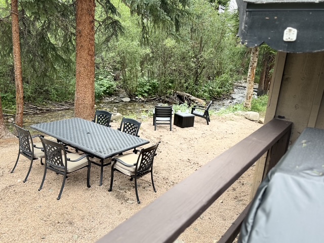 Gather for an outdoor meal, then move closer to the creek to relax and enjoy the peaceful mountain setting.