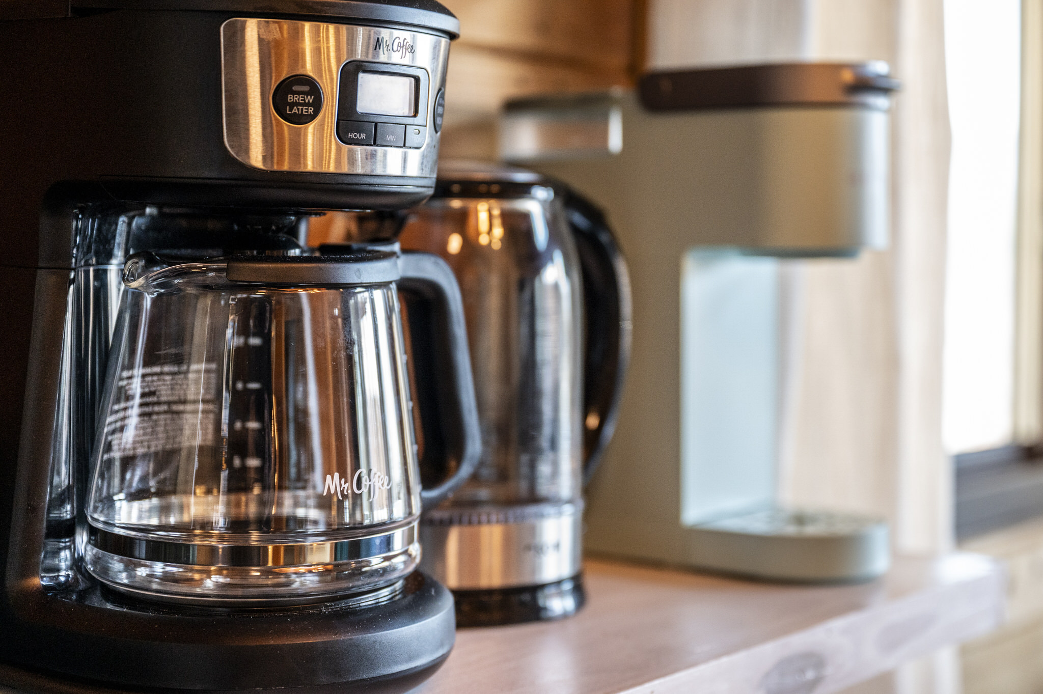 The coffee bar is fully stocked with coffee, and your choice of flavored syrups.