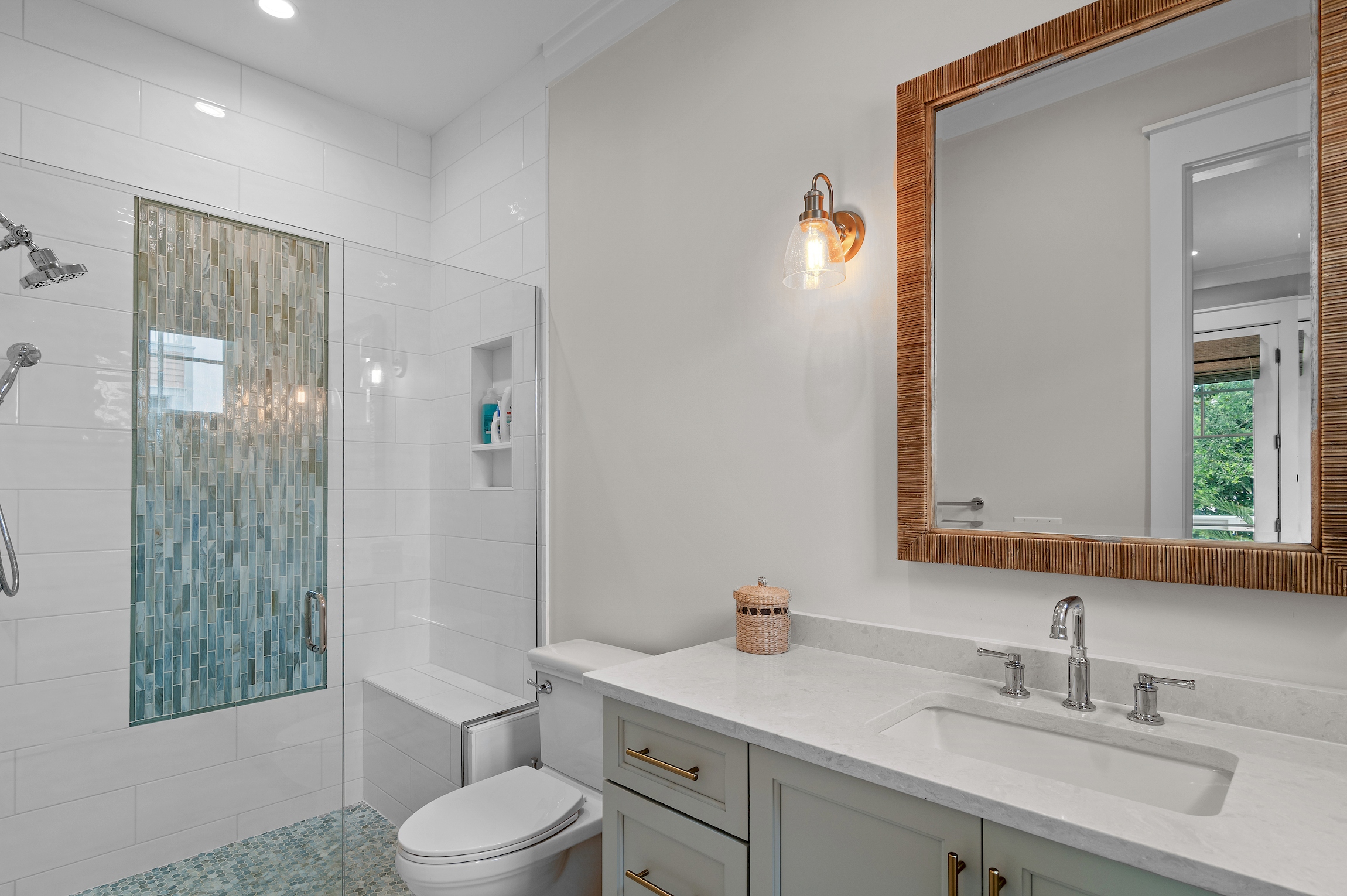 Ensuite bath offers large vanity and walk-in shower.