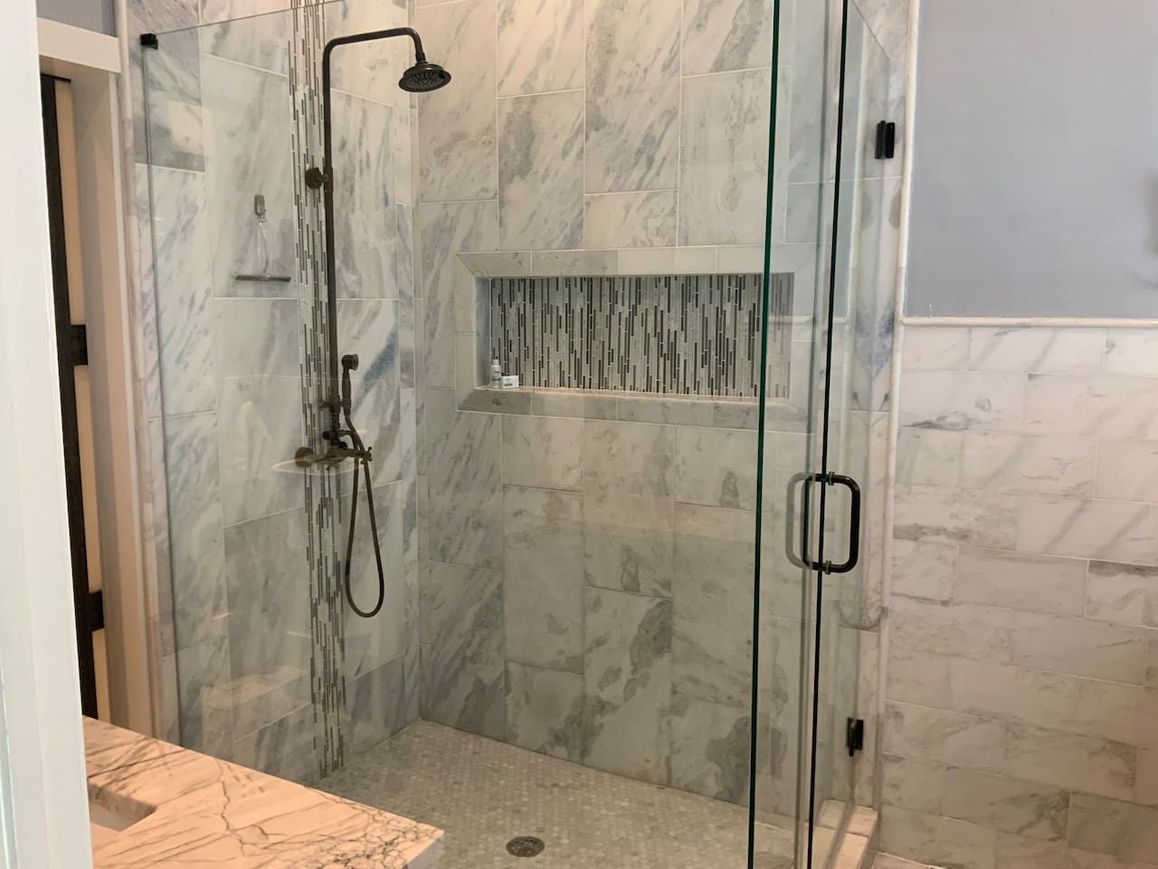 Oversized walk-in shower in master bath.