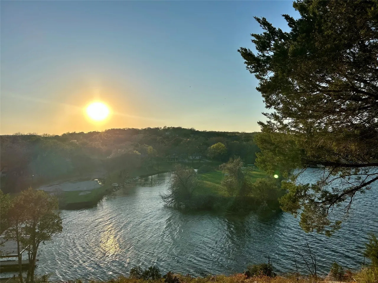 Sunset over the quiet Lake Granbury cove.
