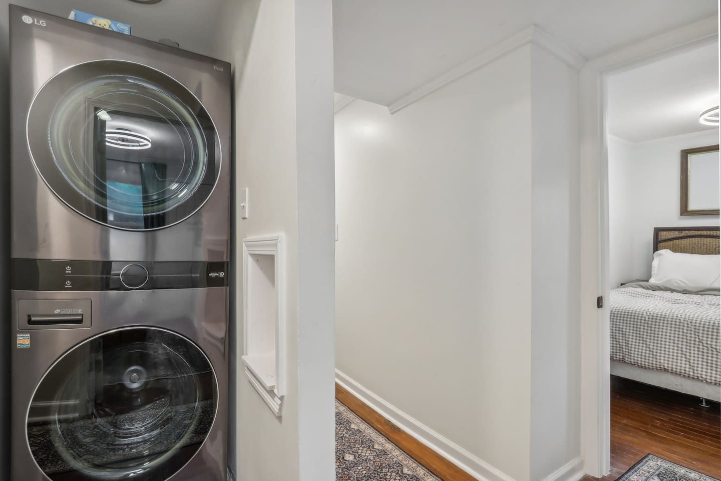 Pack light and stay comfortable with a convenient stacked washer and dryer located just outside the bedroom.