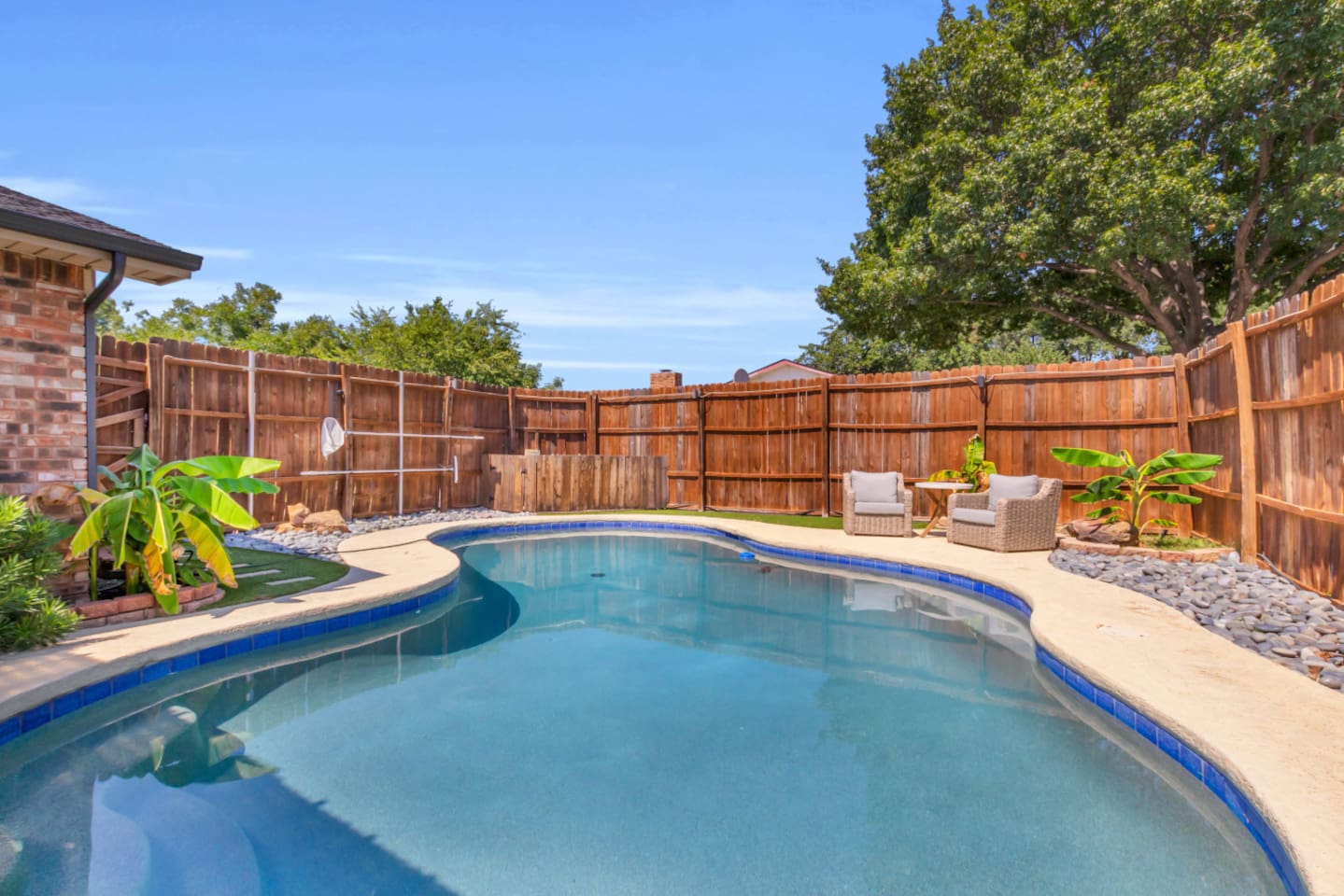 Backyard goals! This oversized pool is made for splashing, lounging, and long afternoons under the Texas sun