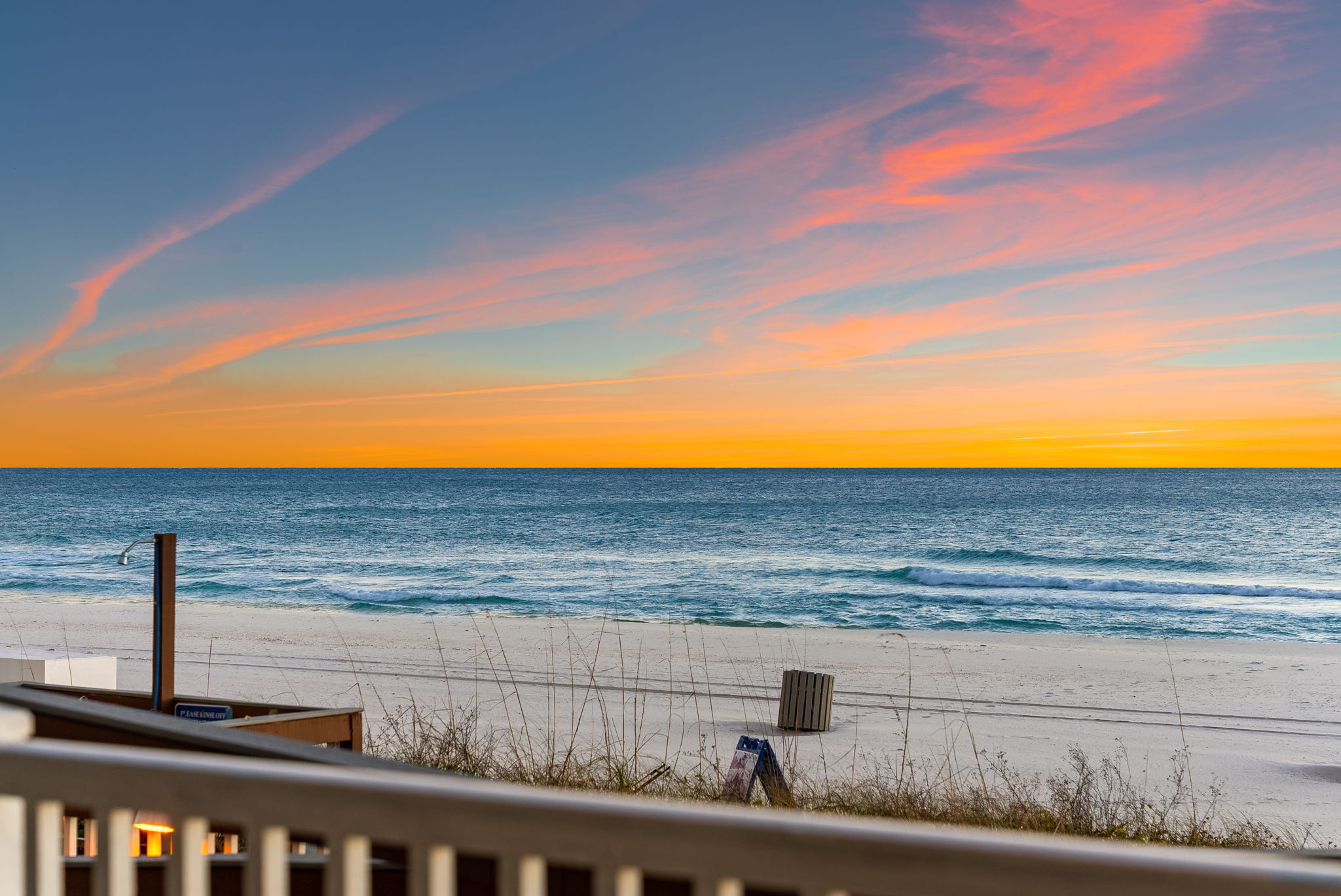 Next to the pool deck is a separate lounging platform where you can just step down to the beach