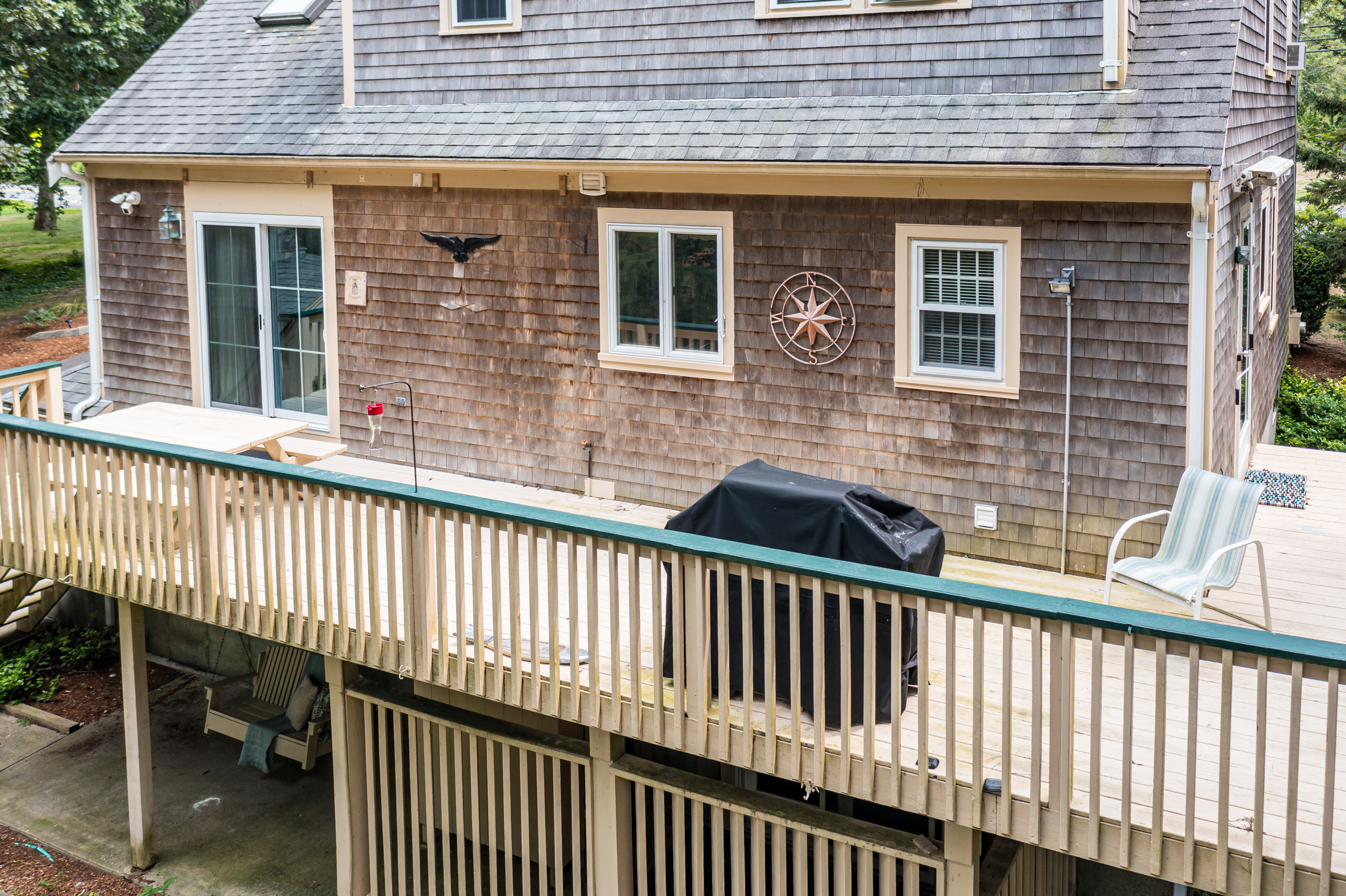Deck with grill—perfect for barbecues and al fresco dining.