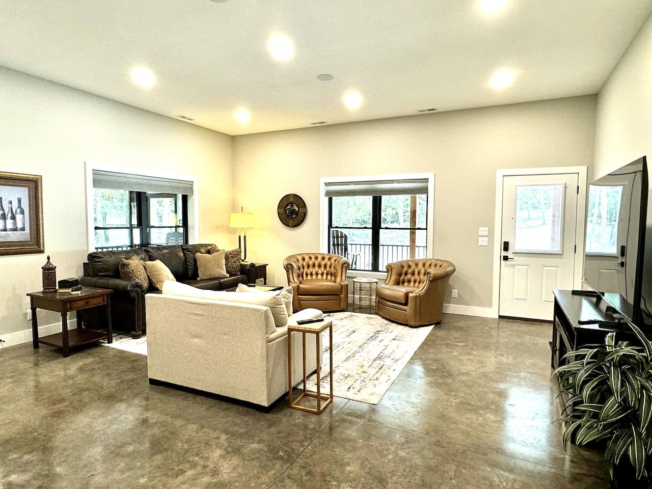 Polished concrete floors and large open concept living.