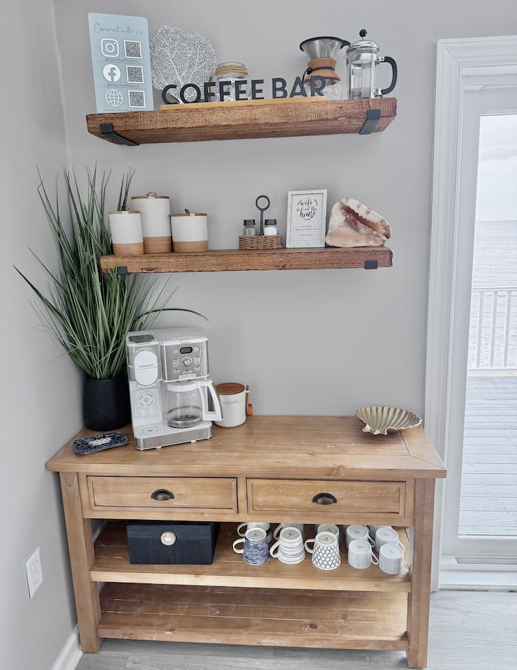 Start your mornings right at this charming coffee bar. It is the perfect, cozy spot for friends and family to gather, brew a fresh cup, and relax together during your dream coastal vacation.