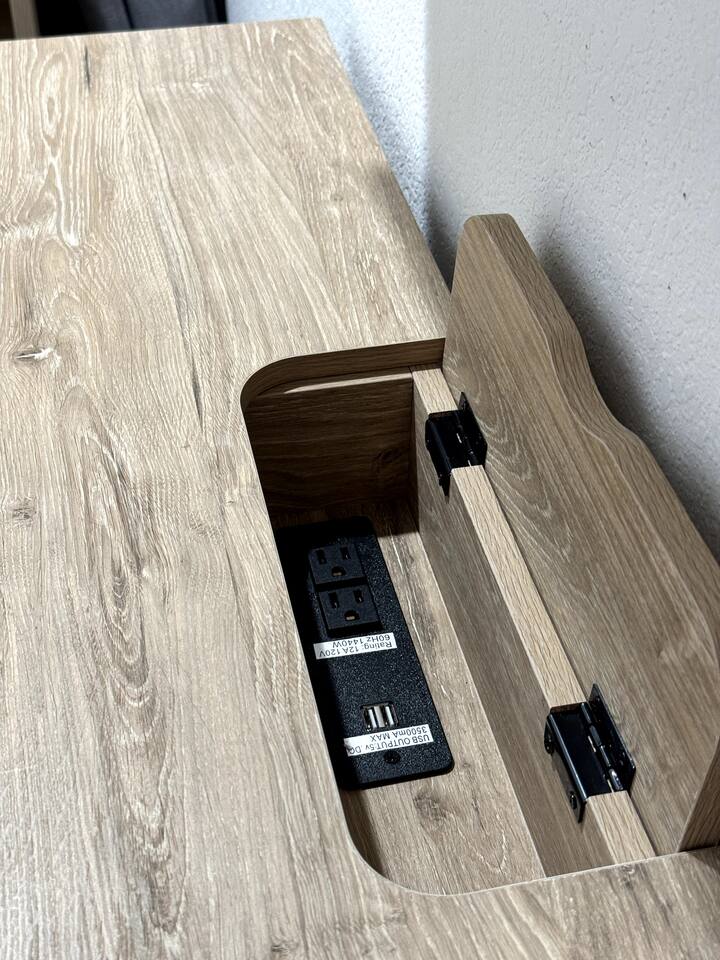 Nightstand and desk have USB charging stations and outlets 