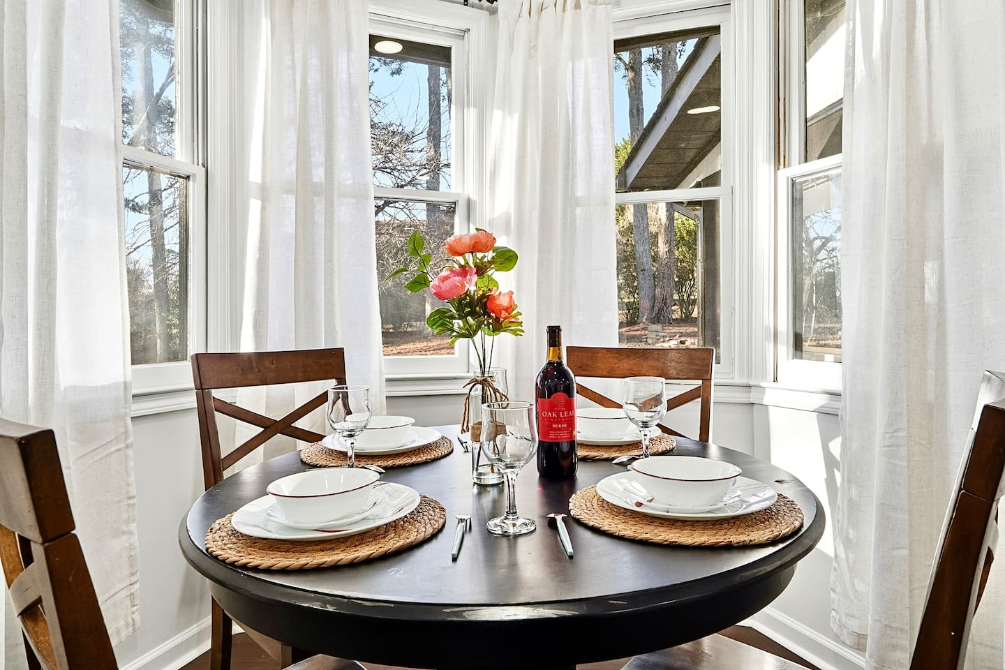 Charming kitchen-side breakfast nook with seating for four. A cozy spot for coffee, breakfast, or casual conversations with family and friends.