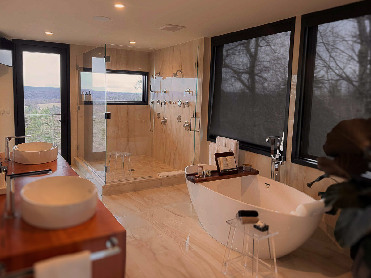 Primary Suite soaking tub and shower combined view &mdash; Sunset Falls