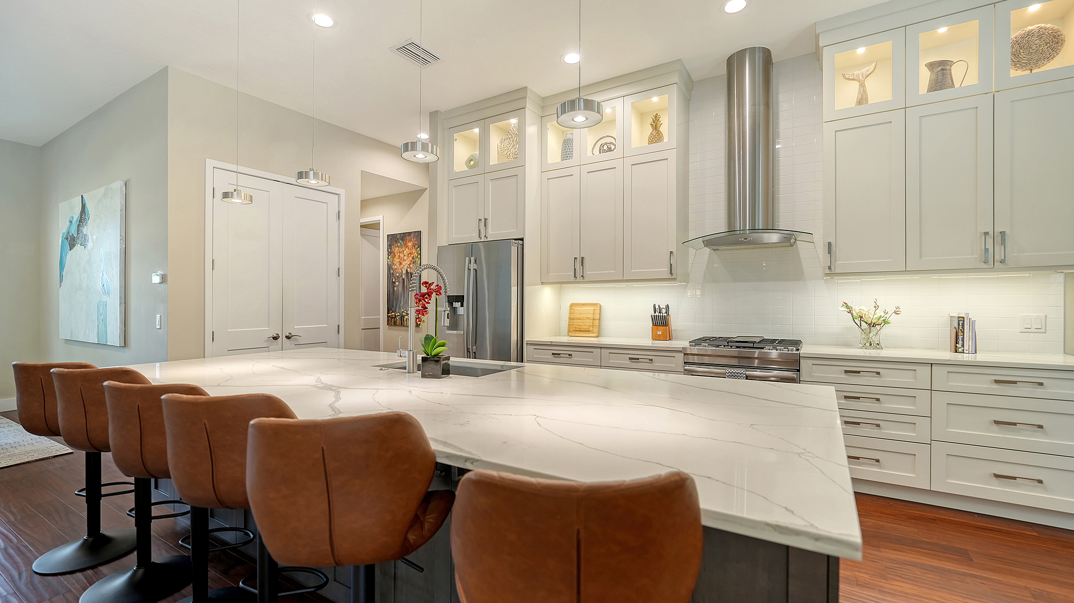Meticulously stocked kitchen complete with dual air fryer, smoothie maker, and cocktail essentials