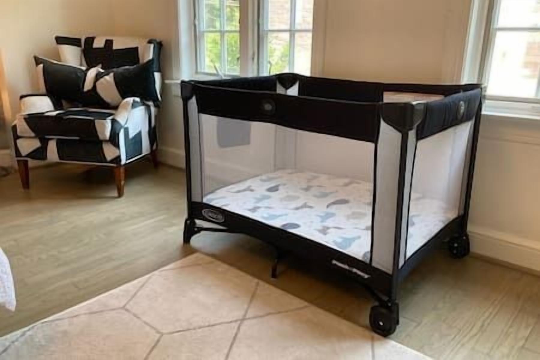 Graco Pack ‘n Play with mattress and sheets available upon request—comfort and peace of mind for traveling families.