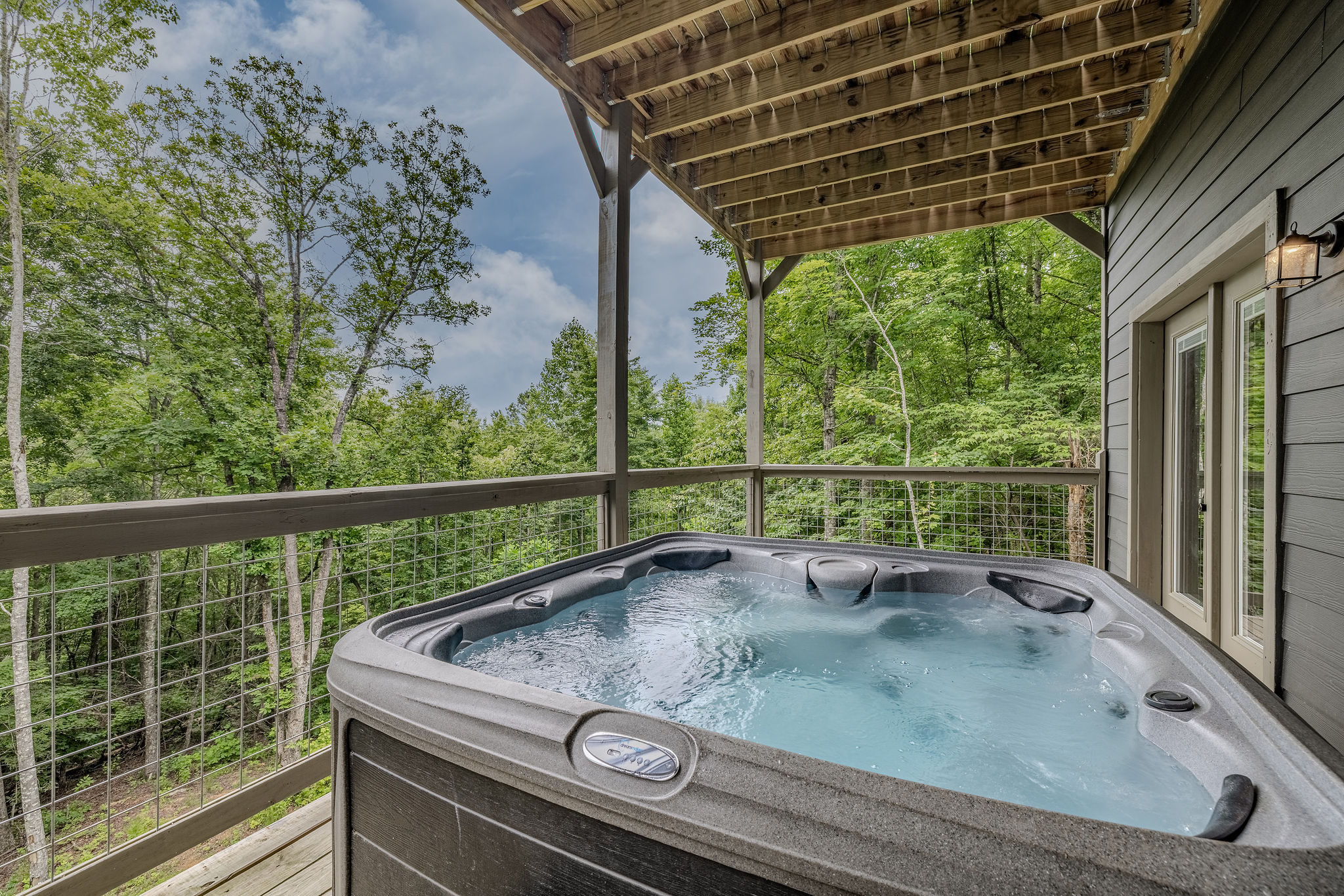 Relax in the private hot tub after hiking, shopping, swimming, or exploring the Smoky Mountains.