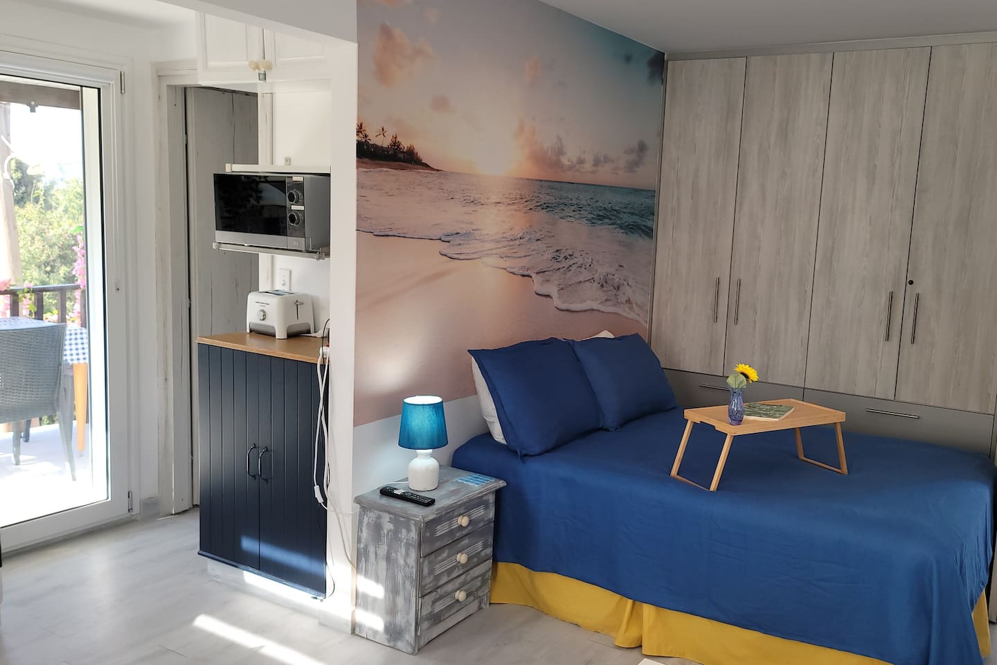 Full size bed, closet with 3 drawers and hanging space with hangars