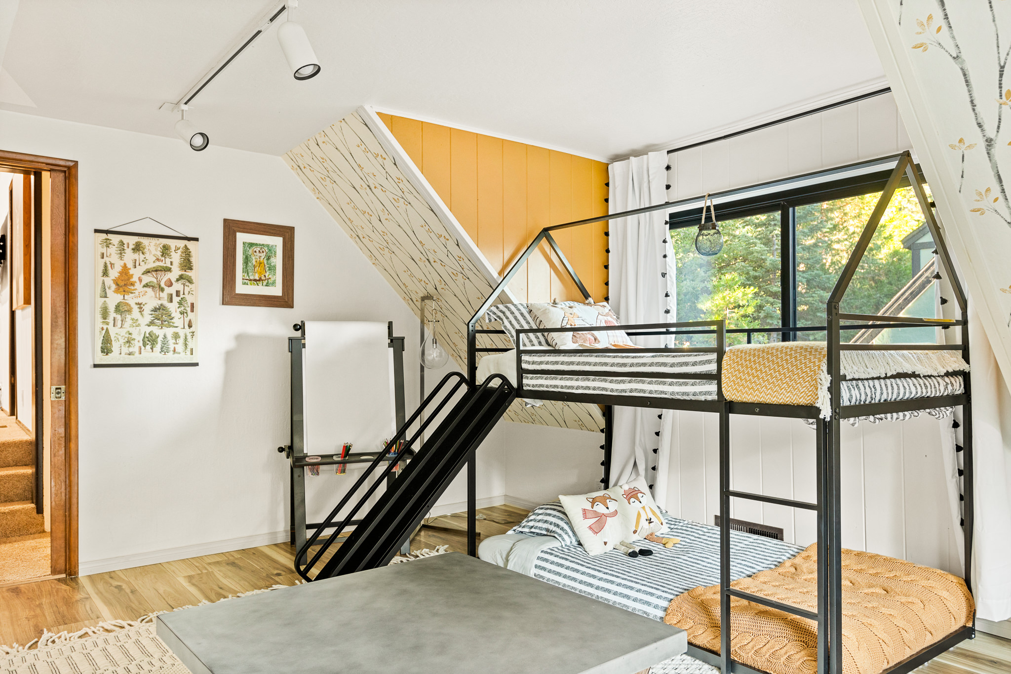 Bedroom 4: Twin bunk beds with a slide is just one element of the fun-filled kids' room!