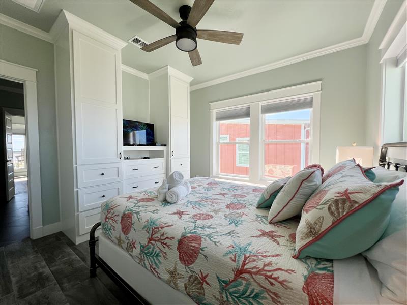 Crystal Paradise Bedroom 2: Refined queen bedroom with elegant finishes and Jack and Jill ensuite, offering both comfort and sophistication.