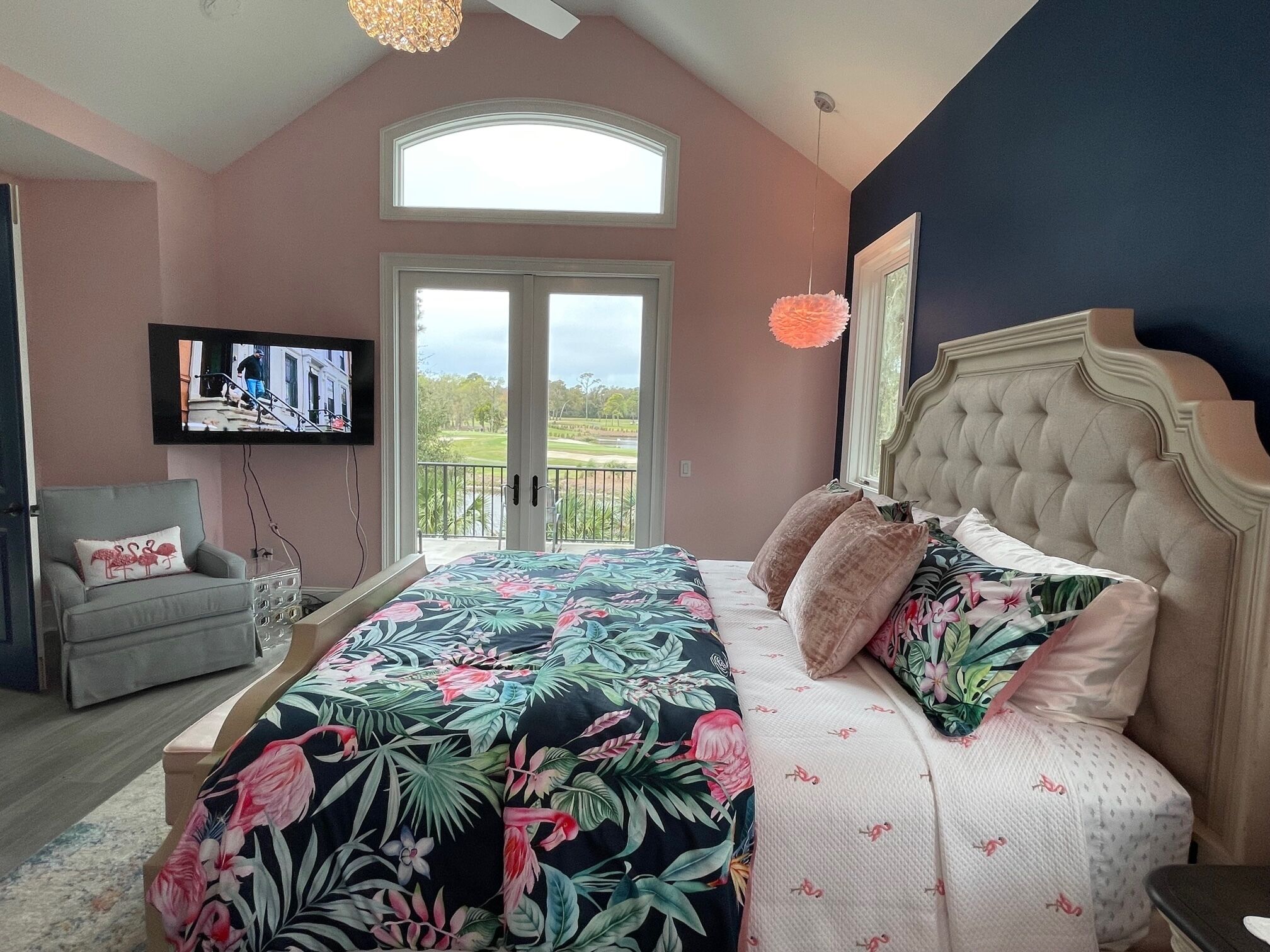 French doors open to 2nd floor balcony overlooking, pool, lagoon & golf course