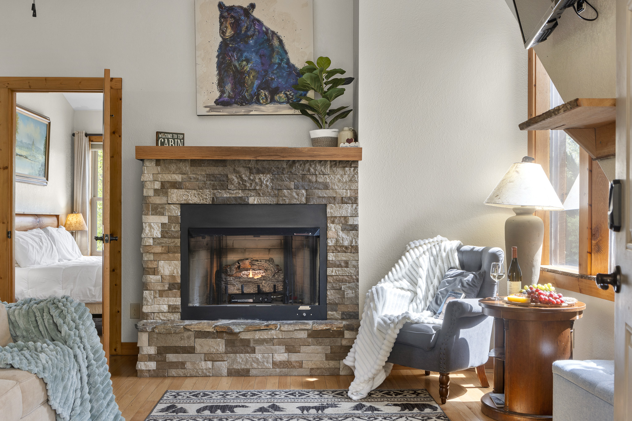 Living Room: Gather around the stone fireplace for relaxation and mountain-inspired charm!