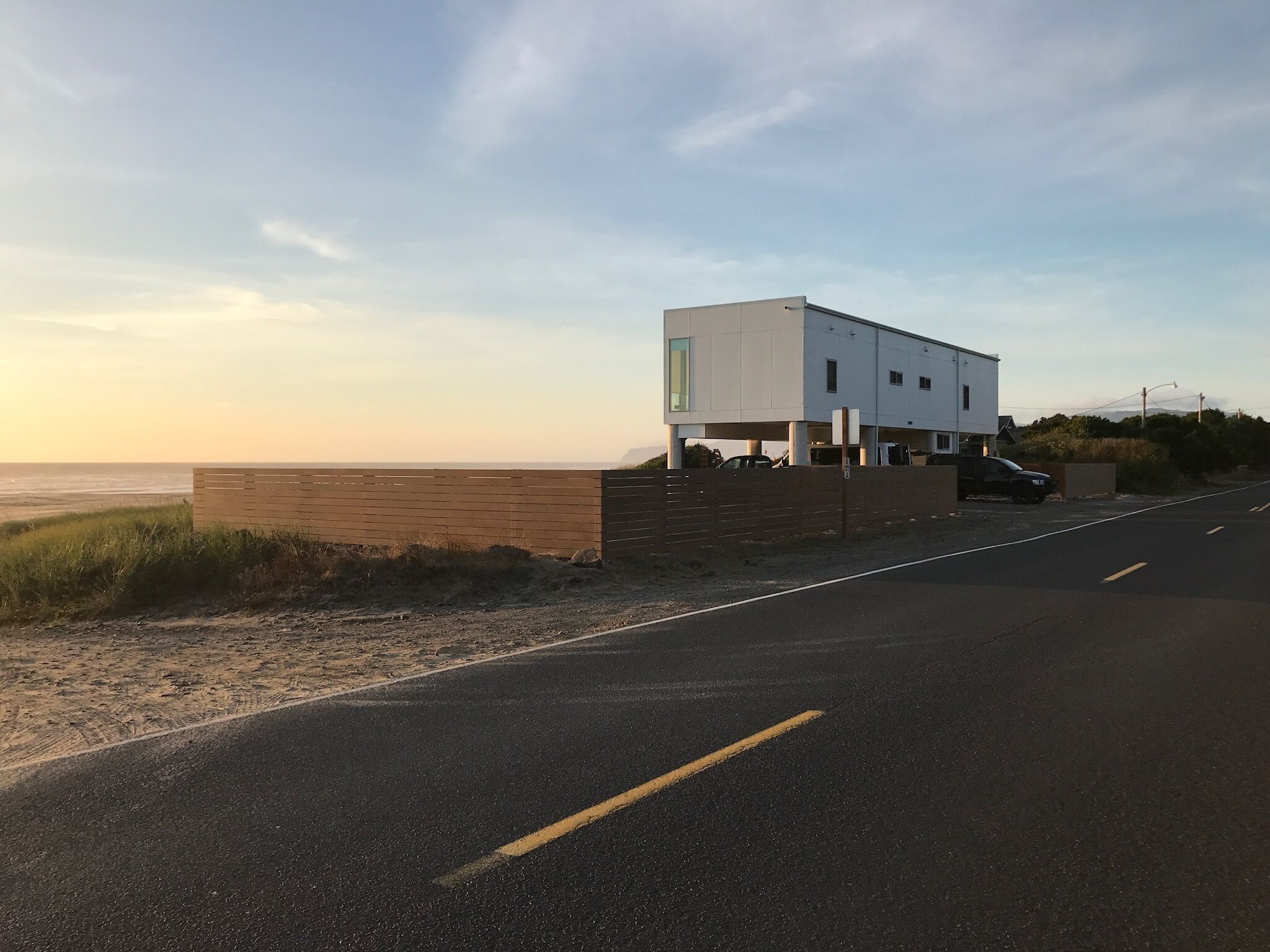 Private yard from the road, but open to the beach!