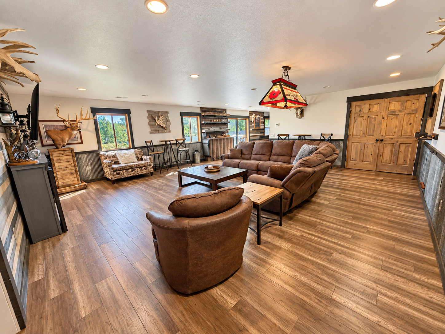 Looking back into the main living area, you’ll find an open, comfortable gathering space with plenty of seating for relaxing, catching up, and spending time with family or friends.