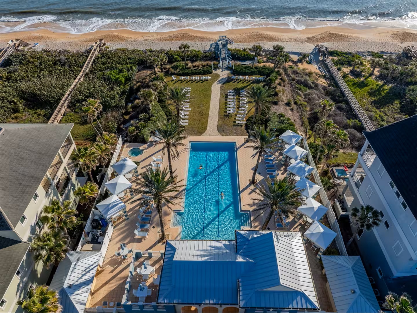 Resort living with direct beach access 🌊
Swim, lounge, and stroll straight to the sand from this stunning oceanfront pool—where Cinnamon Beach vacations truly shine.
