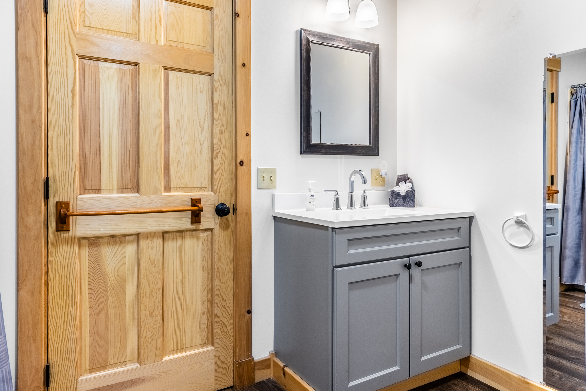 Full bathroom with washer and dryer