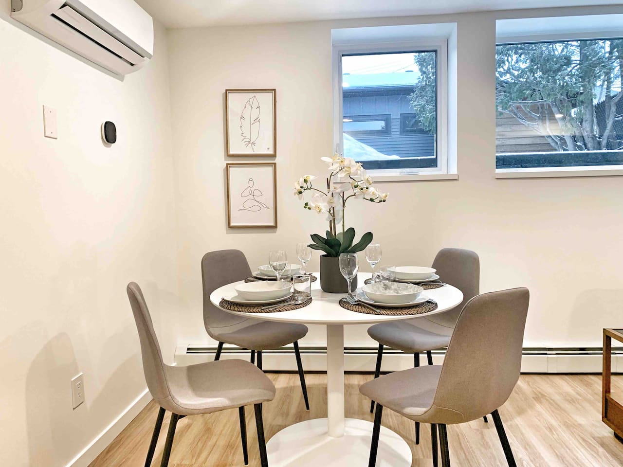 Dining area with seating for four — a comfortable spot for meals, coffee, or planning the day. 