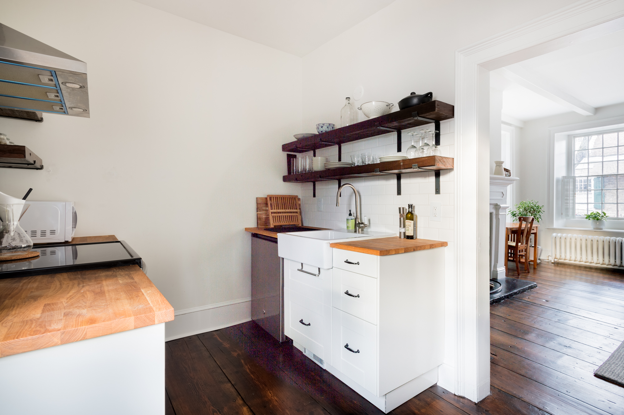 Counter space and open shelving in the kitchen