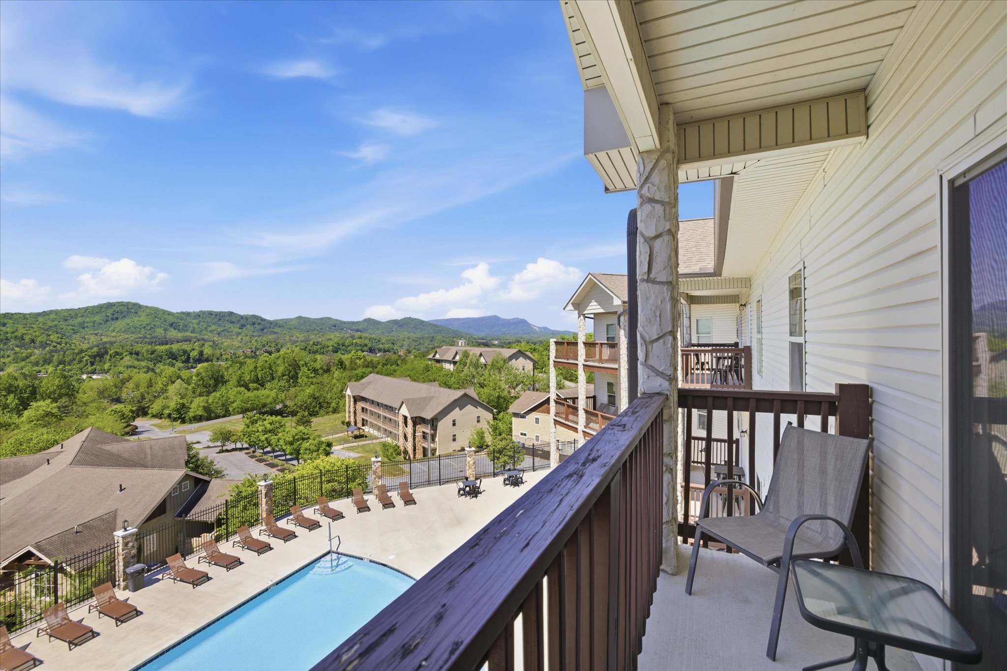 Take in the view from above—being up in Unit 4 gives you a wider look at the mountains and the pool below, making this a spot you’ll come back to often.
