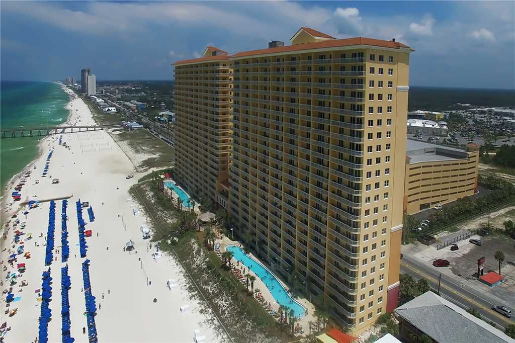 Aerial view of Calypso Resort beachside pools & private beach