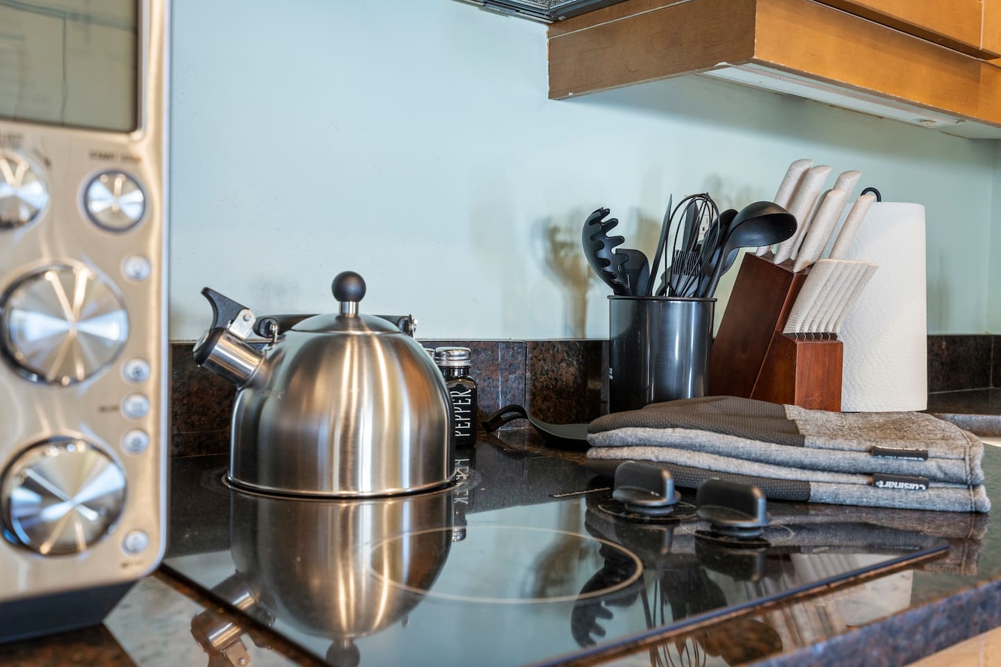 Cooktop and full kitchen tools — ready for everything from a quick coffee to a real dinner