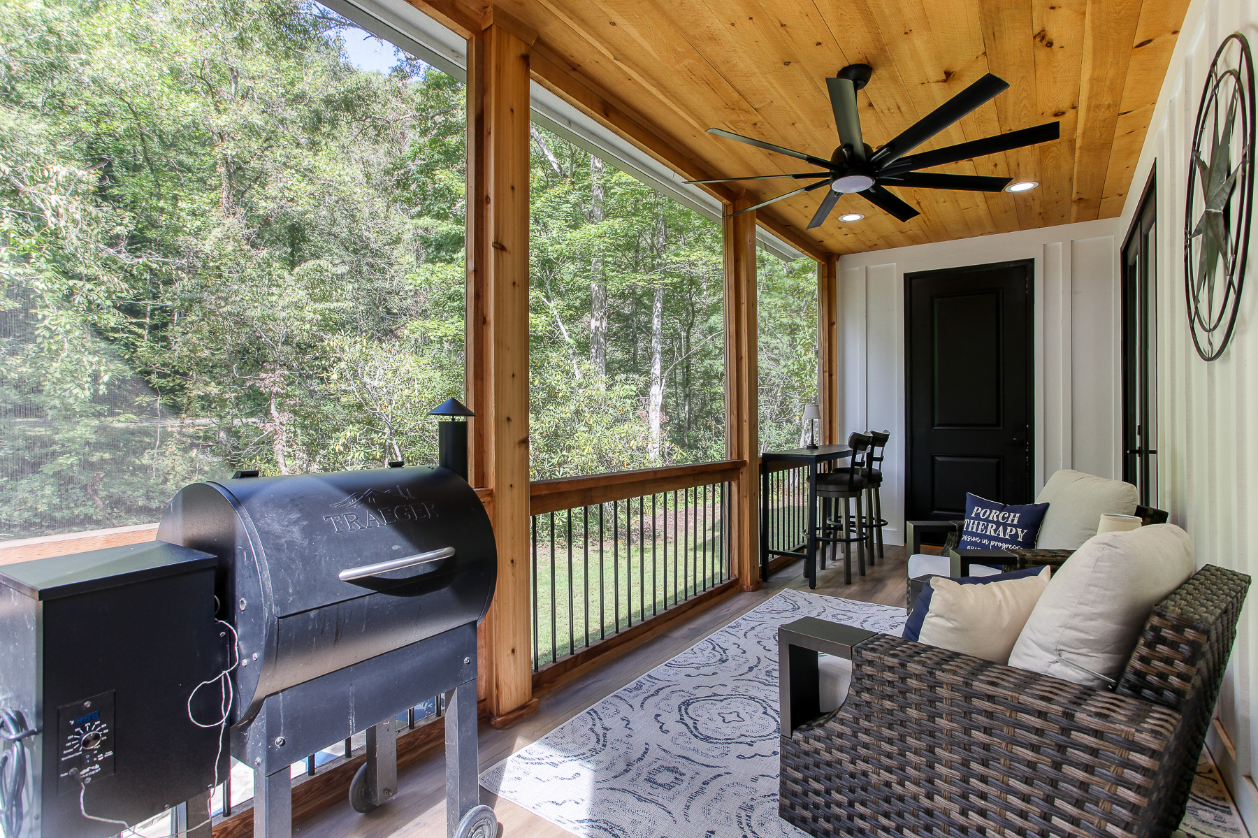 The screened porch at Robbin’s Nest on Snowbird Creek offers a relaxing place to read, chat, and enjoy the sights and sounds of the creek.
