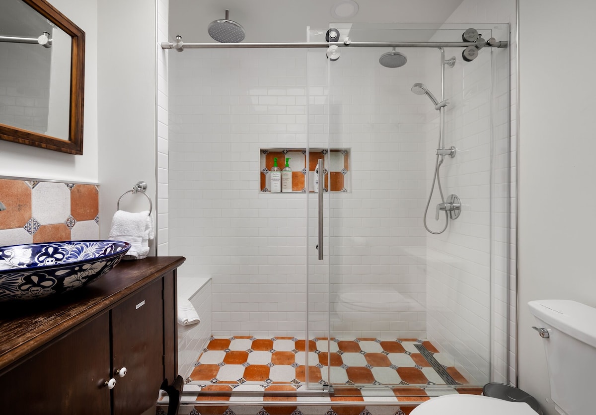 Oversized shower with three shower heads