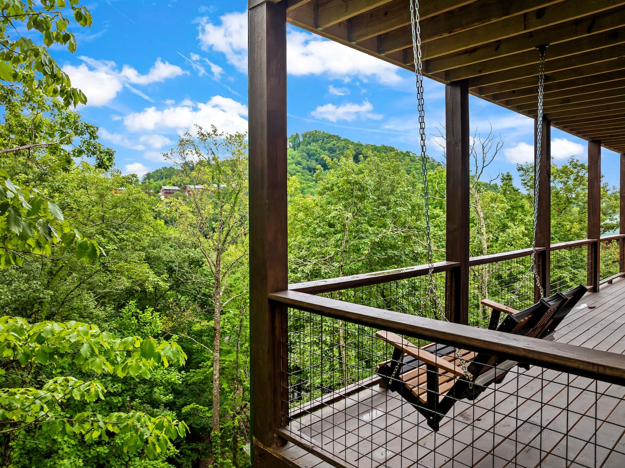 2nd level back deck with 2 person swing 