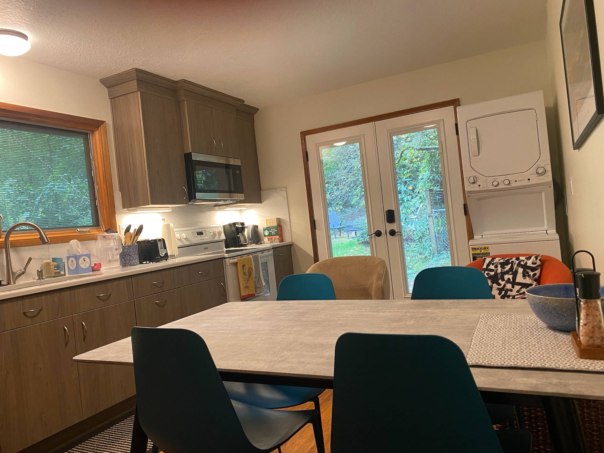 Large dining table doubles as workspace.  There is an option to have a folding table if preferred.