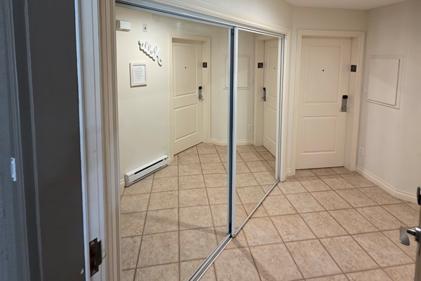 Massive hallway between Unit A and B. Keep the doors open if you rent both Units to move freely between the condos as the hallway is private and secure.