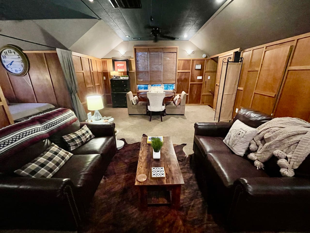 Pair of leather sofas covert to comfy twin beds. Open and airy space with room for dining, relaxing or working. 