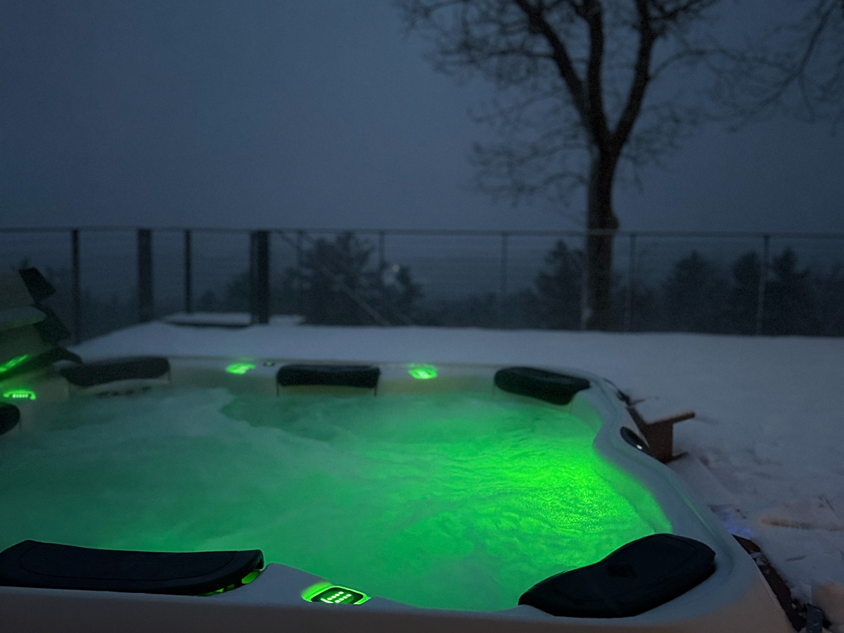 Snowy hot tub at Sunset Falls in winter &mdash; Berkshires holiday season