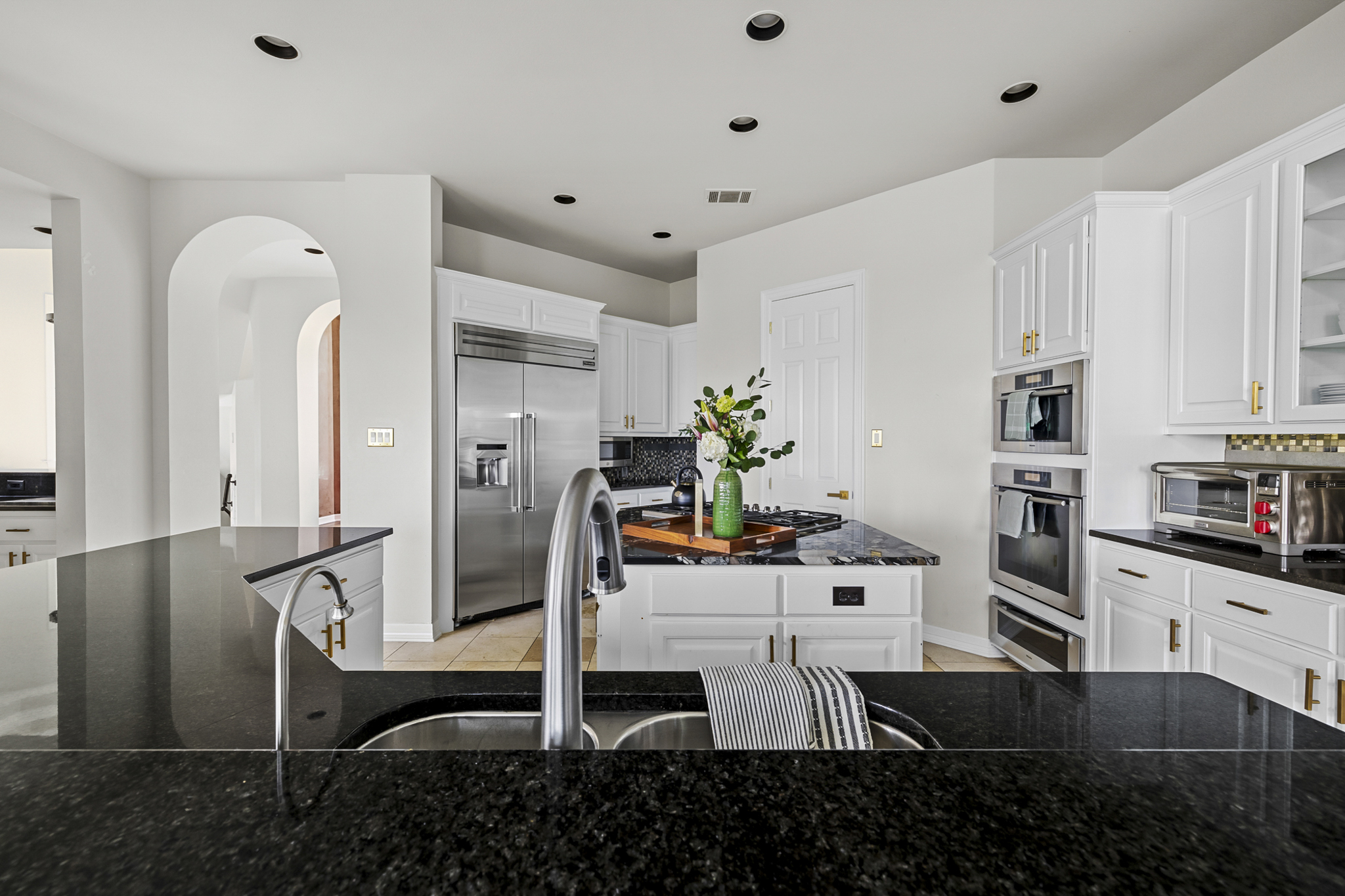 Appliances Include: Miele Gas Cooktop / Miele Oven /  Miele Steam Oven / Thermador Refrigerator / Wolf Toaster Oven.