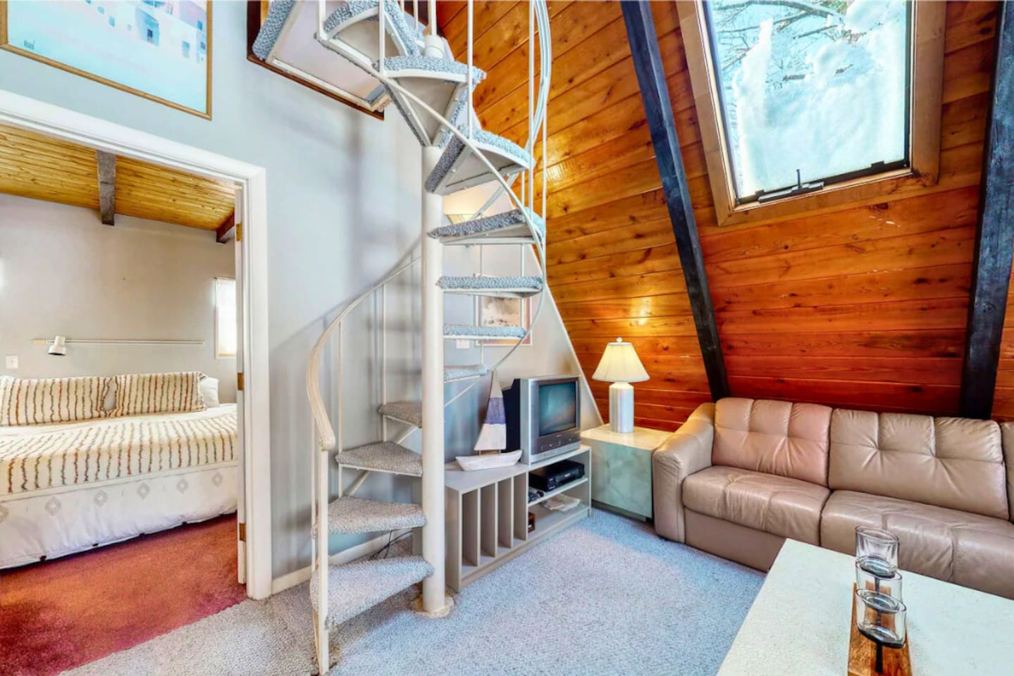 Embrace the spiral staircase leading to the loft! 