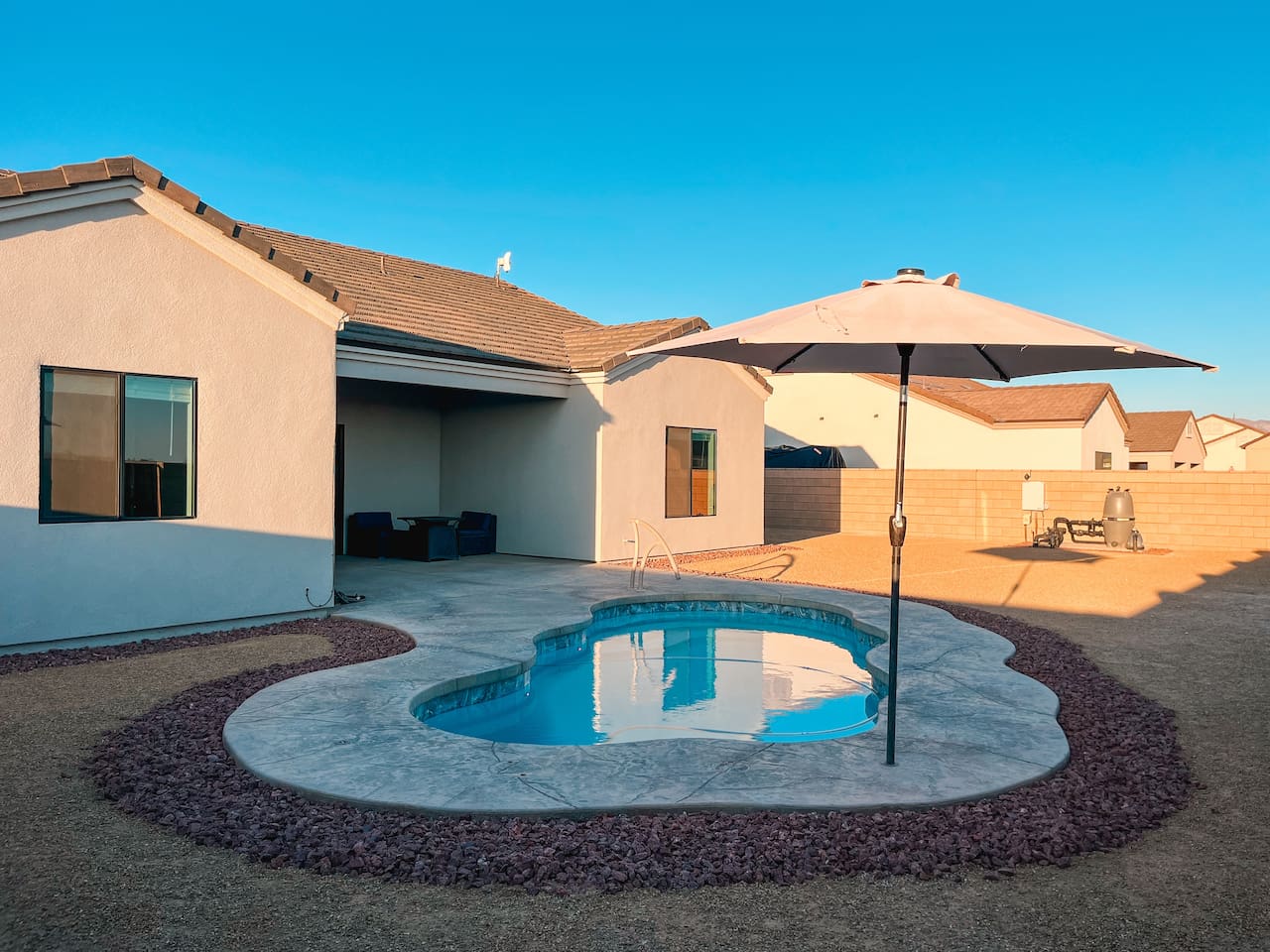 Private backyard pool. Perfect for relaxing and soaking up the sun