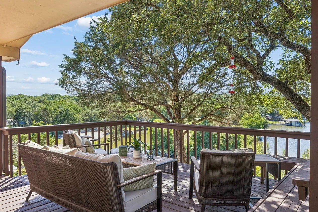 Furnished outdoor seating for relaxing above the lake.