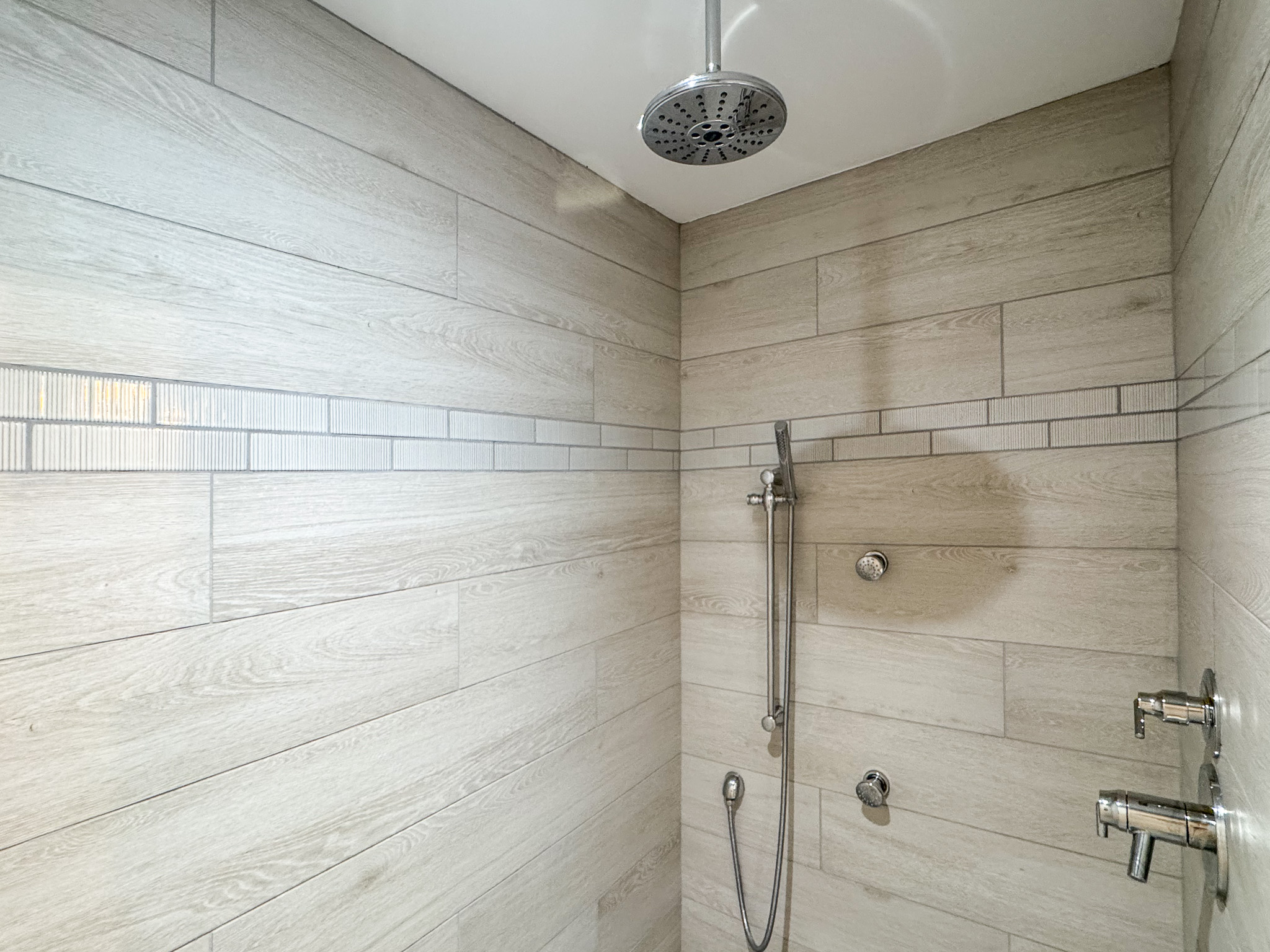 Walk in custom tile shower.