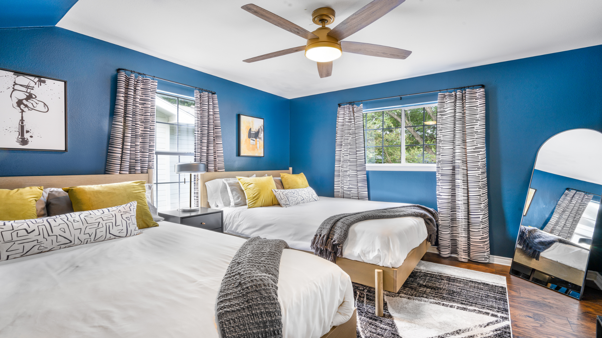 Step into this vibrant oasis with 2 queen beds. A chic full-length mirror makes sure you always look gorgeous, while the modern decor and cozy ambiance invite you to unwind for a perfect night