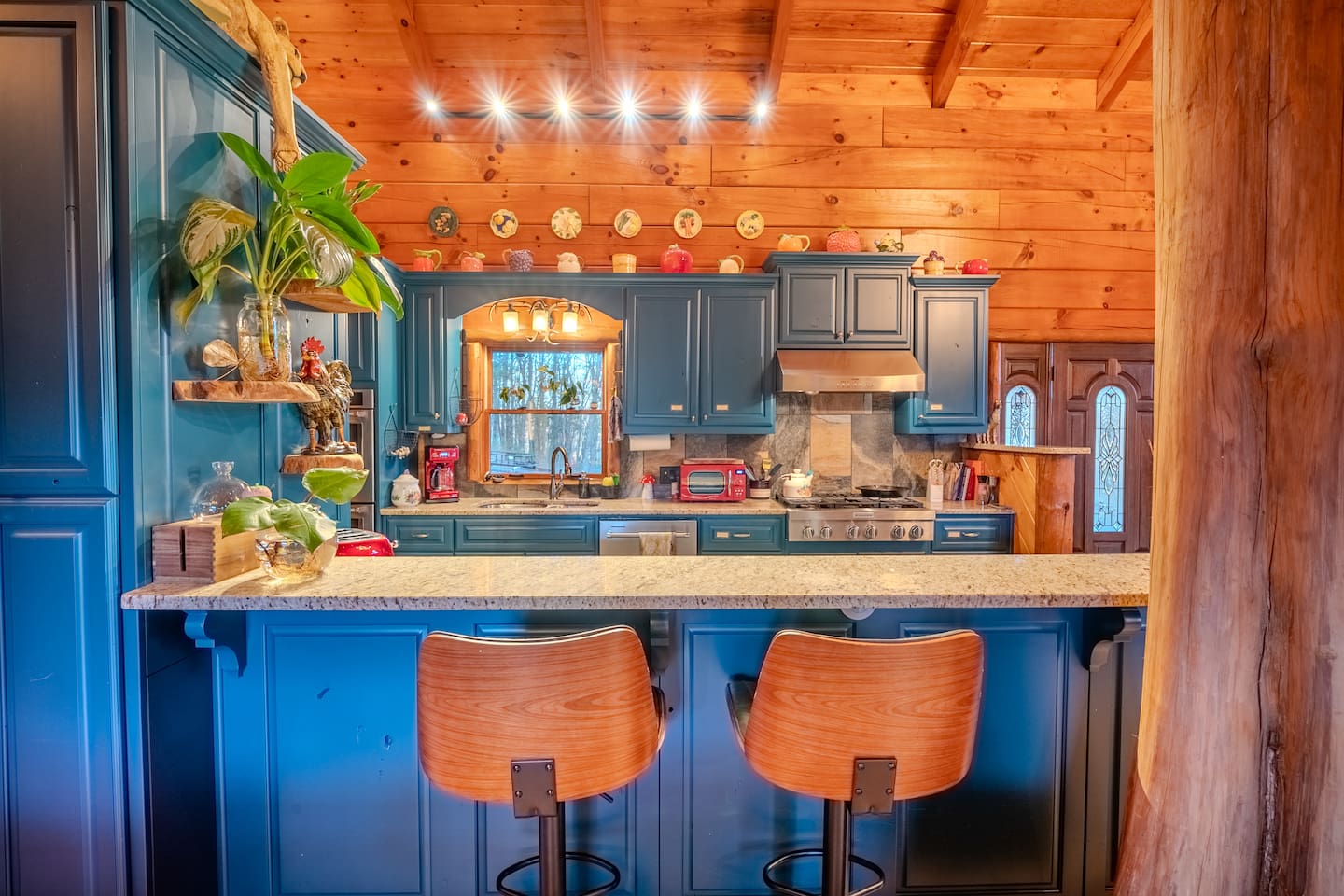Kitchen with bar top stools