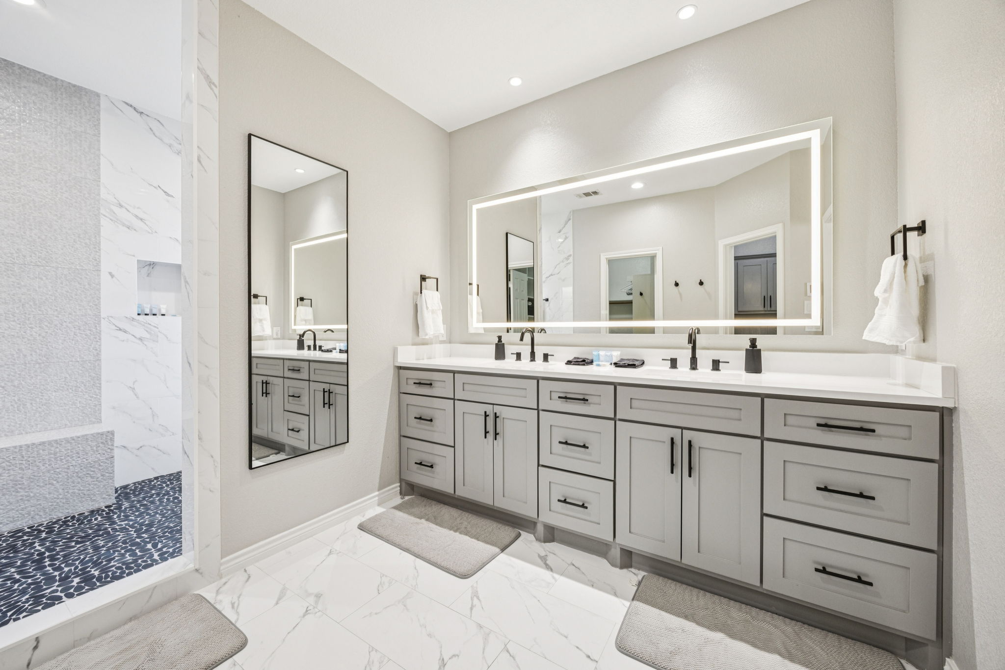 Dual vanities make morning and evening routines a breeze.