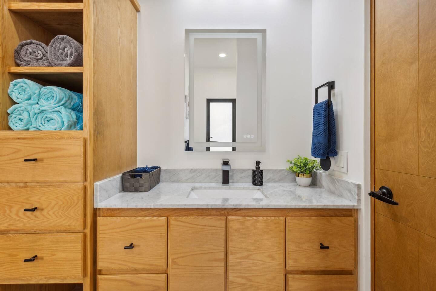 Step into the sleek master bathroom, featuring a LED mirror with 3-color dimmable lights and anti-fog technology, spacious shower. Perfect for a refreshing start, this luxurious retreat enhances your Mexico getaway.